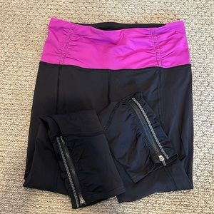 Lululemon legging, with purple band. Small blue paint spot (can get out)